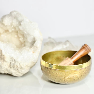 singing bowl with clear quartz druzy rock at embrace crystals