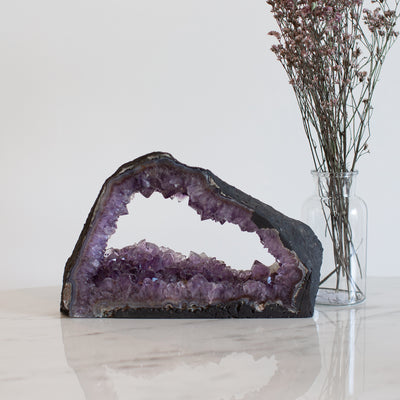 Enter the Mystical Realm of Amethyst with an Open Cave Formation