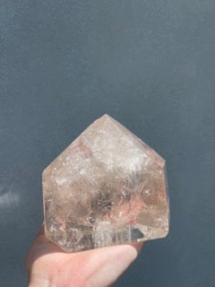 large clear quartz with smoky point