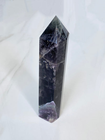 Unleash the Vibrant Energy with a Large Fluorite Generator Point