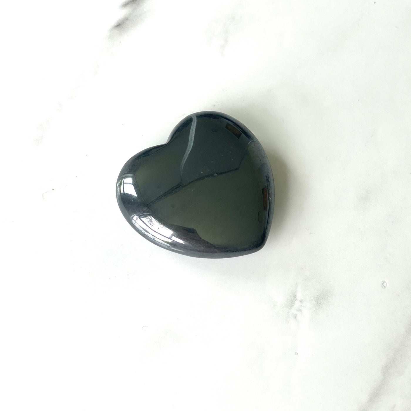 "Grounding and Protective Energy: Hematite Heart Crystal"